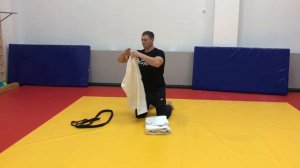 Складываем кимоно, дзюдо