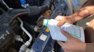 Toyota Vitz engine oil and coolant change