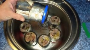 Сельдь в масле в автоклаве