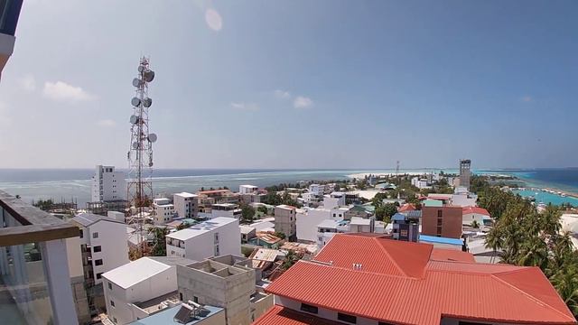 Kaani Beach Hotel, Маафуши, Мальдивы. Вид на остров с крыши отеля. смотреть онлайн