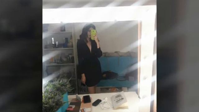 Эта женщина в окне.