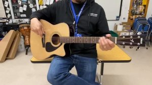Checking out the YAMAHA FX370C A/E Guitar