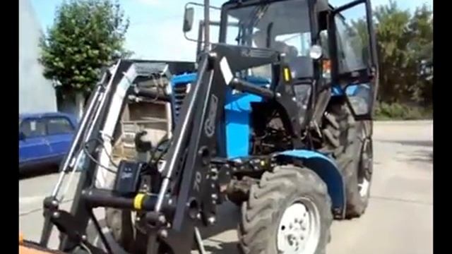 Фронтальный погрузчик Hauer на тракторе МТЗ смотреть онлайн
