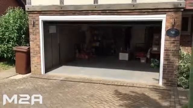 Секционные ворота для гаража в Минске