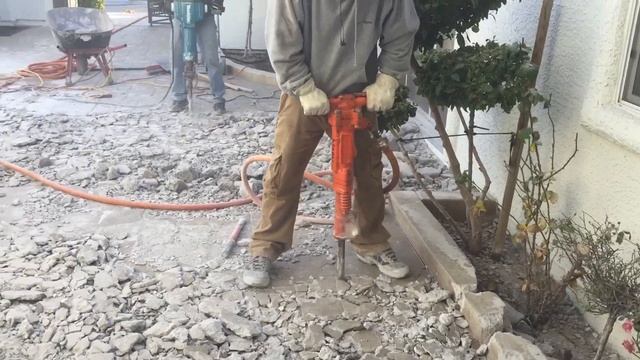 Jack Hammering Concrete With High Powered Air Jack Hammer смотреть онлайн