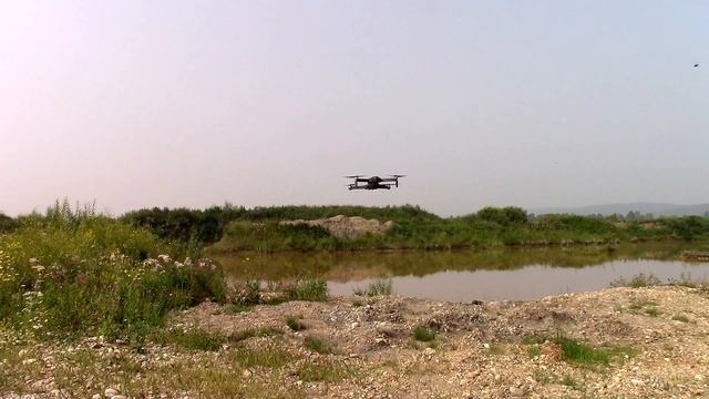 Облёт точки интереса! Дрон SJRC F11 4K PRO. смотреть онлайн