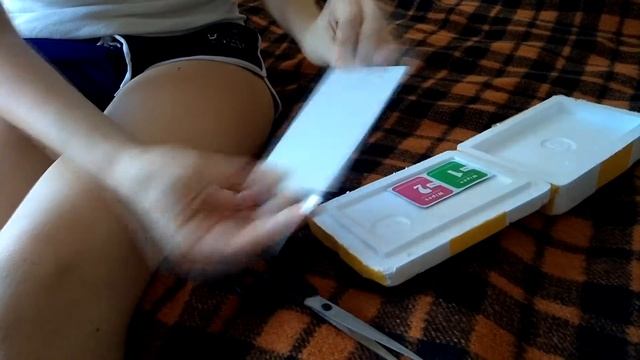 Распаковка защитного стекла для Xiaomi Redmi 3 смотреть онлайн