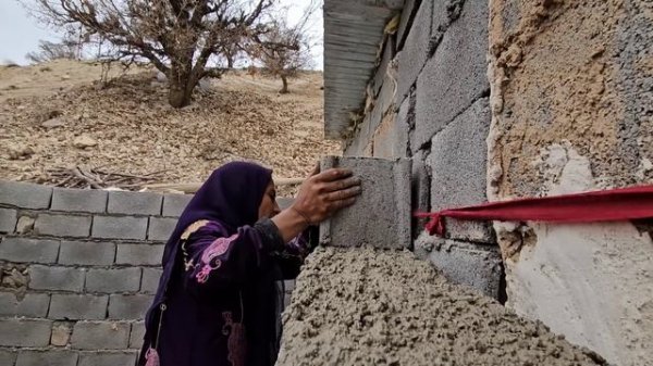 Building Love, Building Shelter: A Single Mother's Resilience