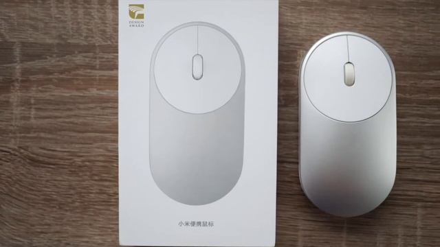 Mi Mouse - мышь от Xiaomi с возможностью подключения по радиомодулю или Bluetooth.