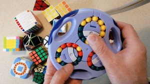 Как собрать головоломку - диск с тремя барабанами шариков  "Круглый кубик Рубика"