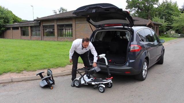 How to get a TGA Minimo Plus 4 mobility scooter into the boot of a car смотреть онлайн