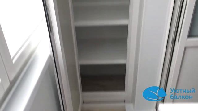 Компания "Уютный балкон" г.Уфа | Обшивка балкона ПВХ сэндвич-панелями с установкой шкафа и тумбы. смотреть онлайн