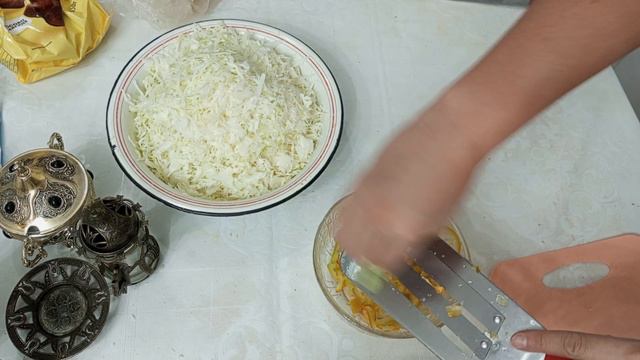 chopped cabbage and sweet before and mixed for salad in Astana Kazakhstan at 02.12.2023 смотреть онлайн
