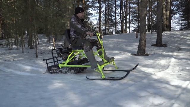 Компактный, полностью разборный мотобуксировщик "Волчок" с лыжным модулем смотреть онлайн