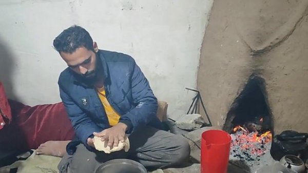 Nomadic Life: Master Salman and Daughter Janan in Rainy Nature