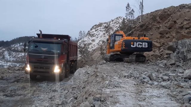 Экскаватор JCB погрузка скалы смотреть онлайн