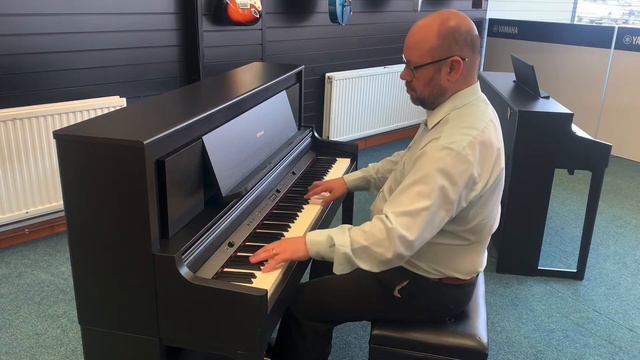 Martin plays the Roland LX706 for World Piano Day смотреть онлайн