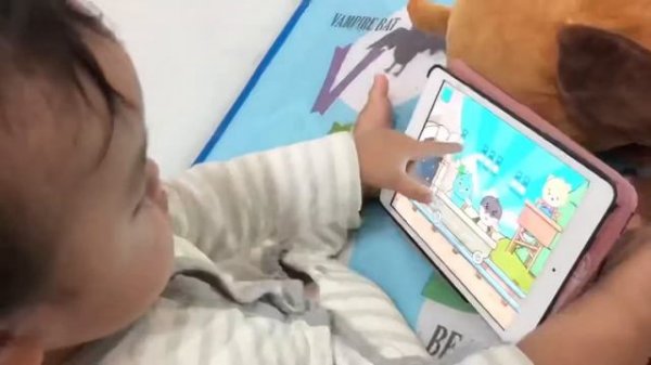 Baby Playing BIMI BOO Games iPad #1