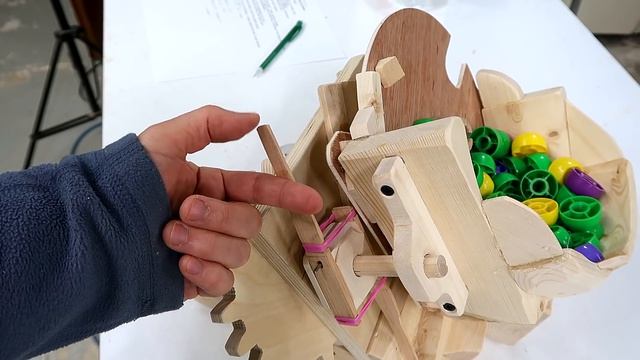 Hopper fed catapult: Motivations and challenges