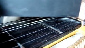 высота струн над 1 ладом