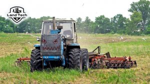 Трактор Т-150К с тяжелой дисковой бороной БДТ-7 - обработка залежной земли!