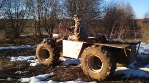 Мотоблок по грязи на ободрышах.