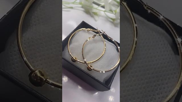 Серьги бижутерия "Кольца с подвижным шариком" золото 3,5см смотреть онлайн