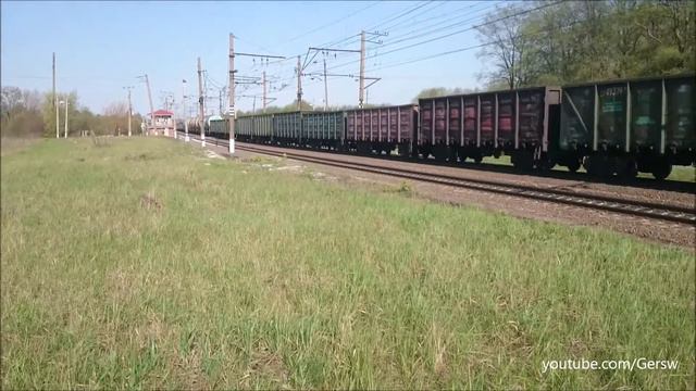 Скоростной поезд ЭС1-022 "Ласточка" + Электровоз 3ЭС4К-032 с грузовым поездом смотреть онлайн