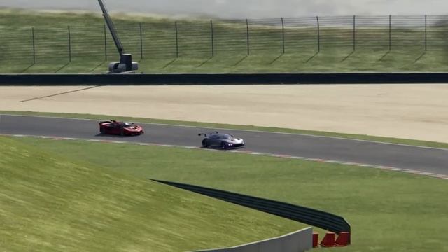 Battle Ferrari FXX-K vs Aston Martin Vulcan Racing at Mugello смотреть онлайн