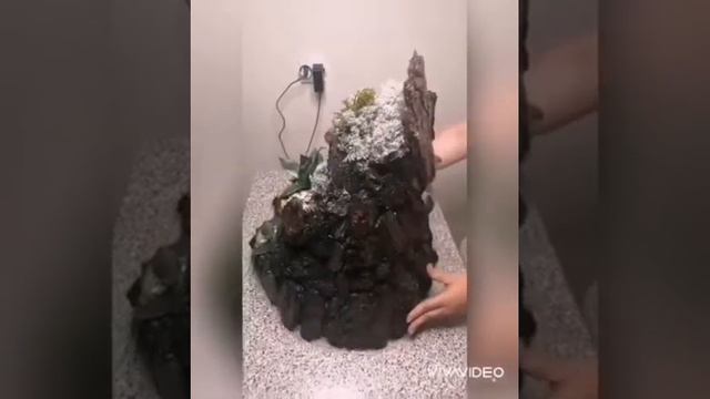 Комнатный фонтан с живыми растениями. смотреть онлайн