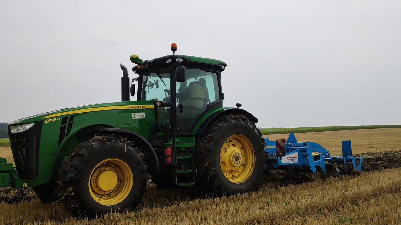 Как это так? снег летом, но Джон Дир 285 тащит Диггер по мокрому полю смотреть онлайн