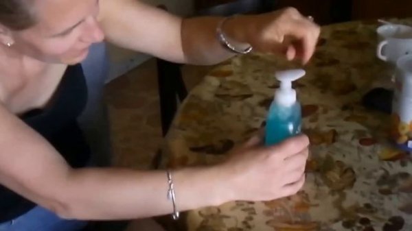 Trying to open a twist lock liquid soap bottle