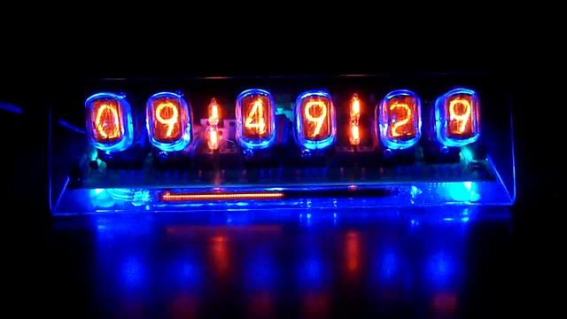 Часы на PIC18F2550 и газоразрядных индикаторах ИН-12А смотреть онлайн
