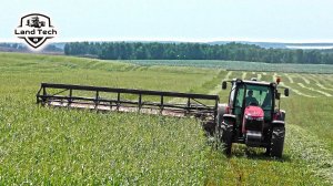 Трактор Massey Ferguson 6713 работает с прицепной жаткой ЖВЗ-7 ПОЛЕСЬЕ. Суданская трава на сенаж.