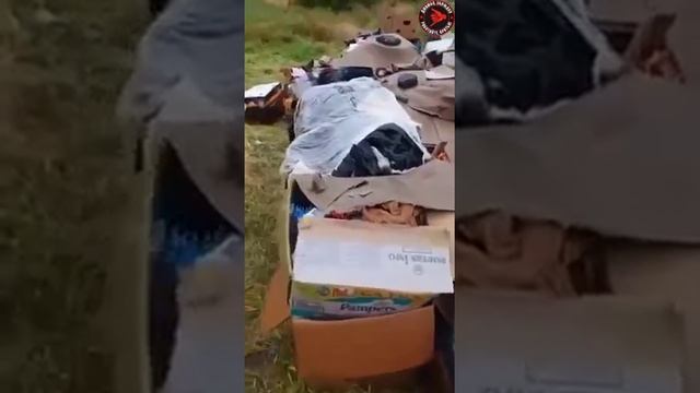 В Херсоне укроволонтёры выбросили гуманитарную помощь. Тёплые вещи для людей оказались выброшены в смотреть онлайн