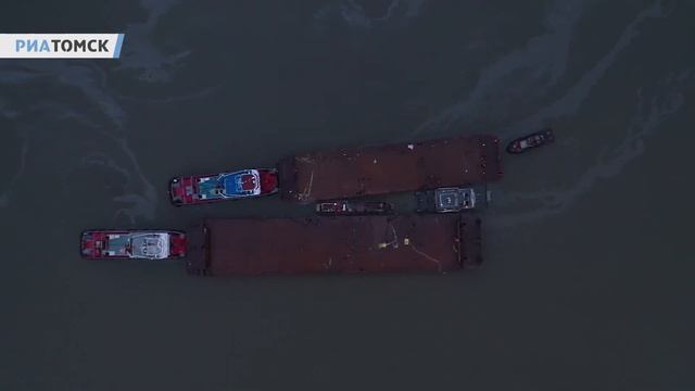 Буксировка затонувшего теплохода из Эуштинской протоки в порт Томска смотреть онлайн