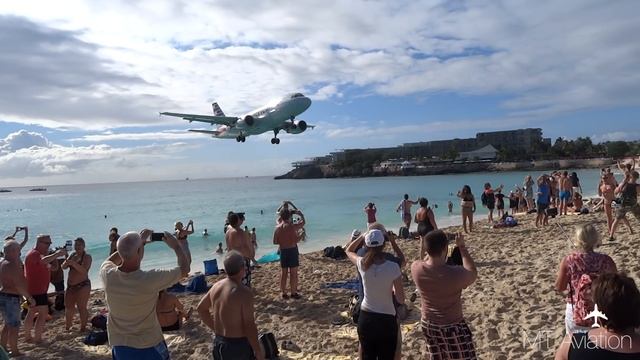 Extremely Low Landing at St Maarten Princess Juliana Airport- American Airlines A319 смотреть онлайн