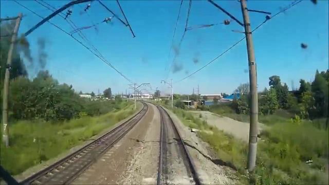 РЖД. Транссиб. Прибытие на станцию Пермь-2. Вид из кабины пассажирского электровоза ЭП2К смотреть онлайн