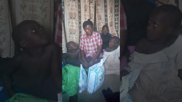 Food donation to suffering Tushabe a mother of three by Hans Hess' family , covidug.org смотреть онлайн