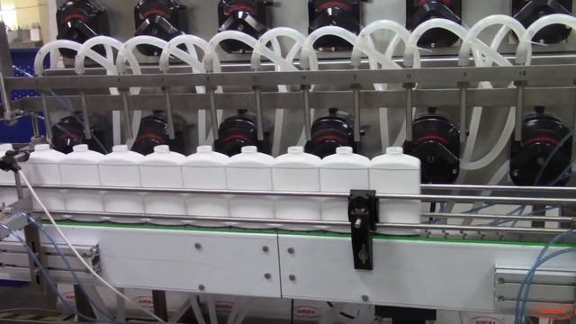 Розлив пенящейся жидкости на МДП-200Л с 12 дозирующими головками. смотреть онлайн