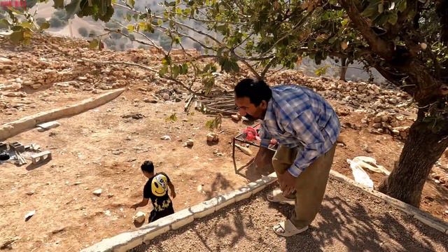 Cementing The Roof Of The House With The Help Of A Devoted Father.