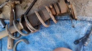 Как снять заднюю стойку и заменить пружину на Nissan Almera Tino!!