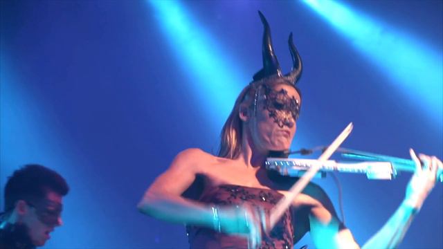 Sarah Mallock, electric LED violinist, performing for the Masquerade Ball, London