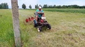 Грабли-ворошилка и самодельный минитрактор.