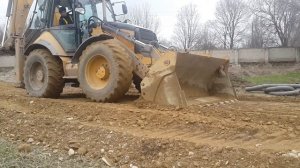 29 марта 2018 г.работа экскаватора-погрузчика Caterpillar 444E