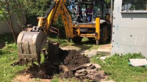 Выкорчёвывание пня трактором. Часть 1