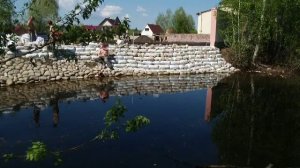 Укрепление берега пруда