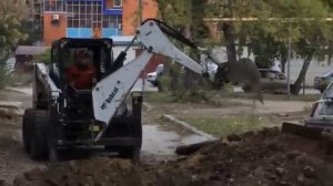 Bobcat c навесным экскаватором