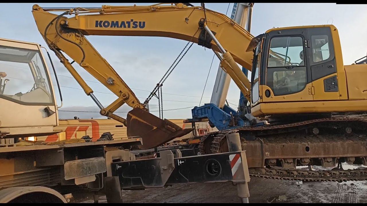 Два 50т крана и трал для экскаватора Komatsu PC300LC, неудачная замена масла в гидравлике и другое