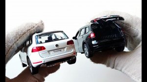 Про машинки. Распаковка и обзор модельки машины Volkswagen Touareg / Фольксваген Туарег.